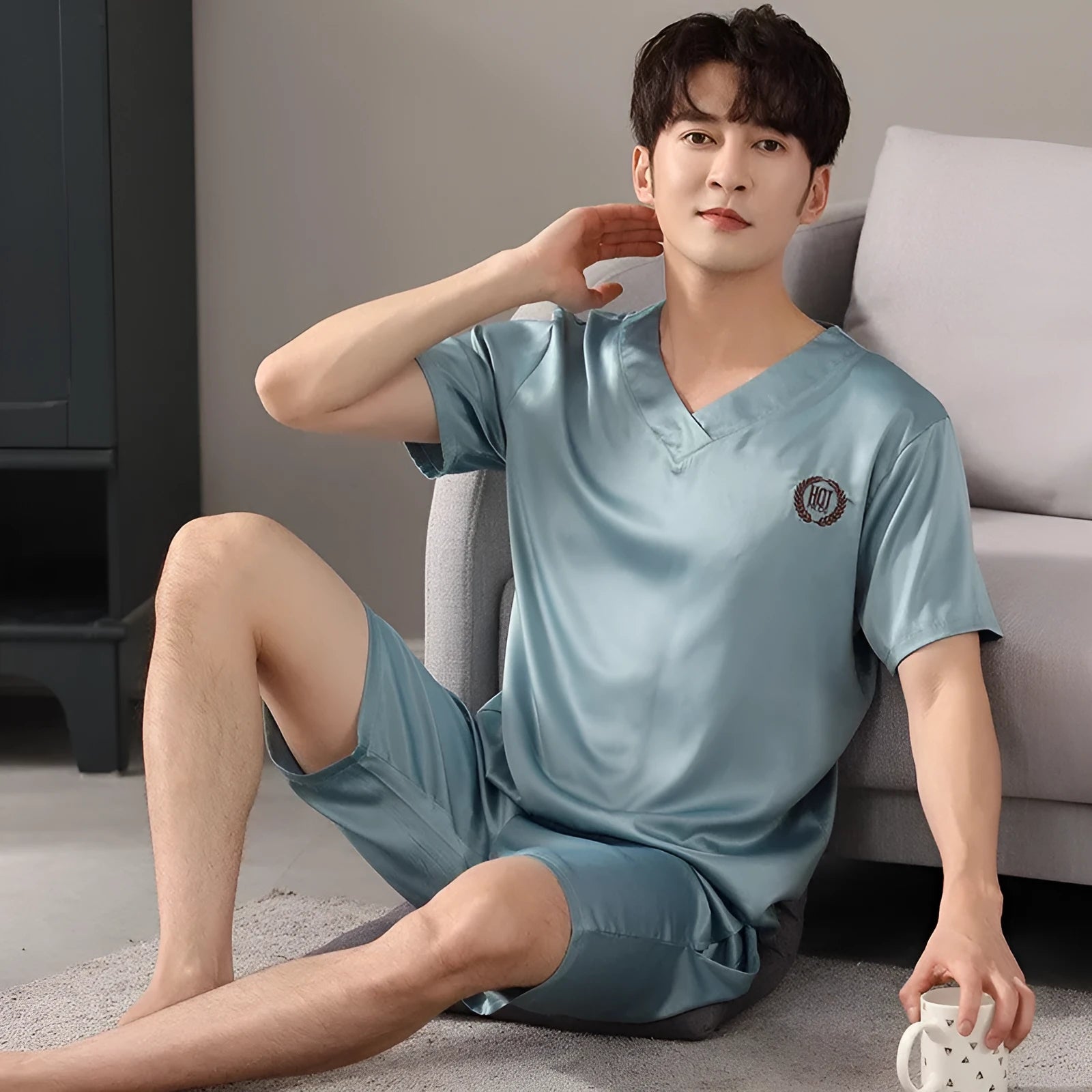 Men's loose-fitting ice silk short-sleeve pajama shirt and shorts set in various colours.