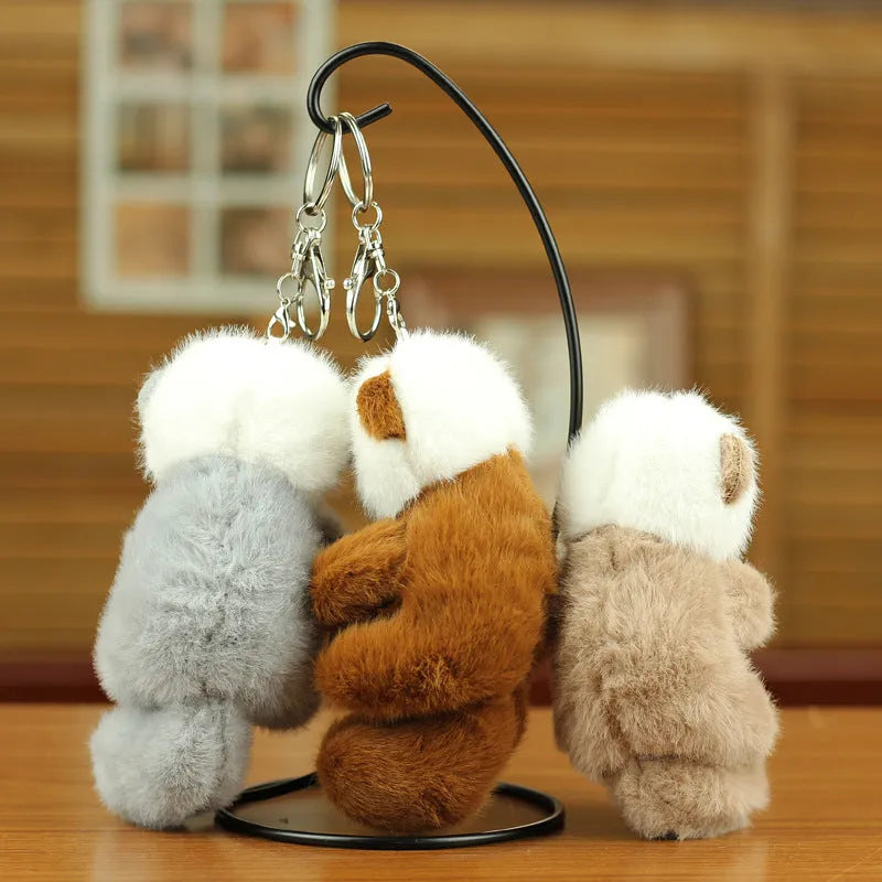 Cute sea otter pendant plush toy keychain with dark brown, light brown, and gray options