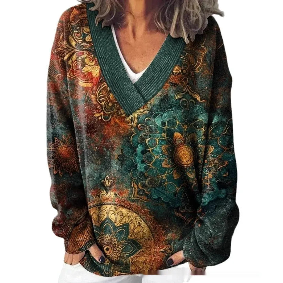 White women's V-neck long sleeve sweatshirt with a detailed 3D floral pattern print.
