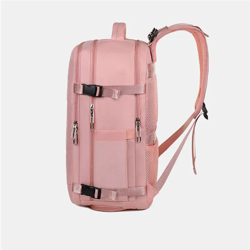 Large purple travel backpack for women with multiple compartments on a grey background.