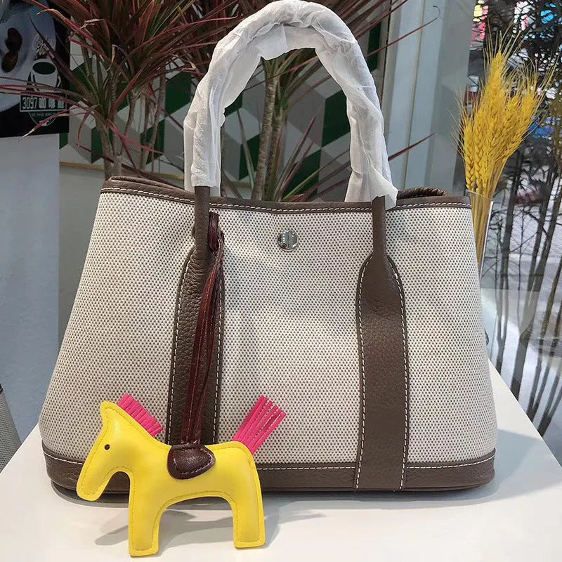Women's canvas and leather crossbody bucket tote bag in multiple colour options