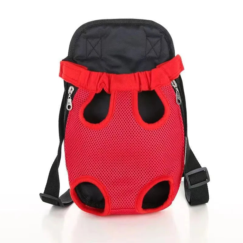 A person wearing a black breathable dog carrier backpack with a small dog inside, showing the open-top design and mesh panels.
