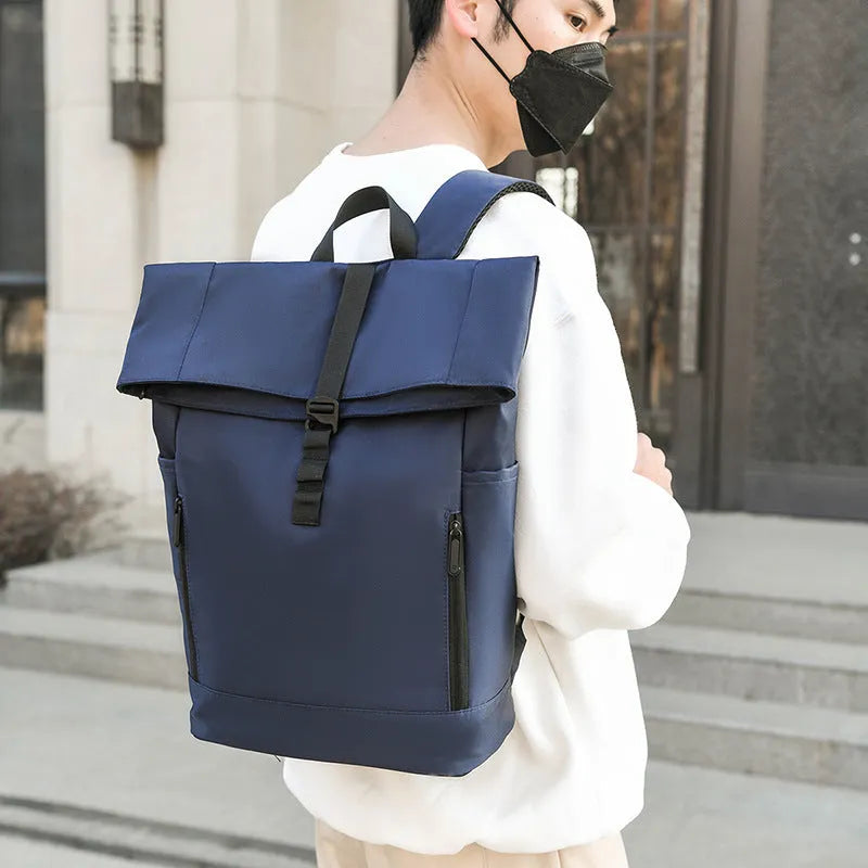 Men's grey nylon business leisure backpack with breathable back panel and zipped compartments