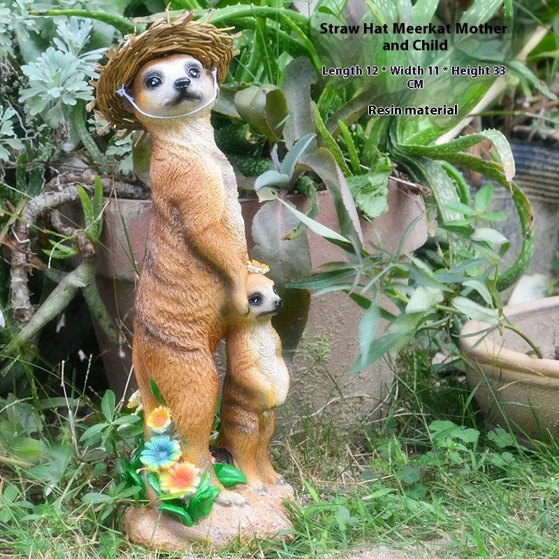 Resin mongoose garden ornament with straw hat and garden tool accessory