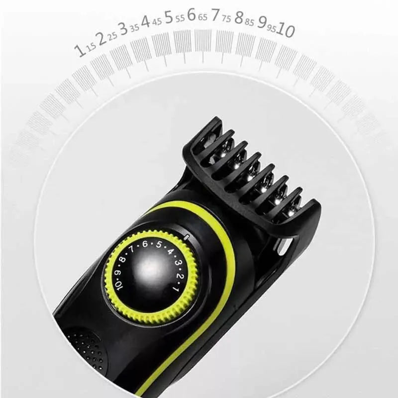 Black KM-696 household electric hair clipper set with USB charging cable and cleaning brush.