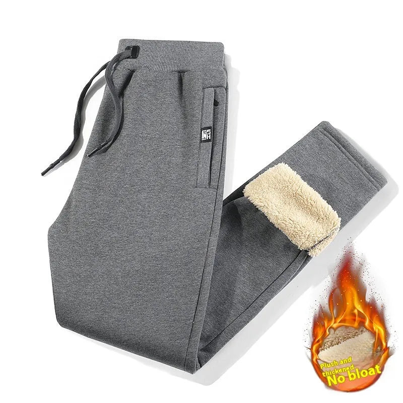 Men's gray fleece-lined track pants with drawstring waist in oversized fit