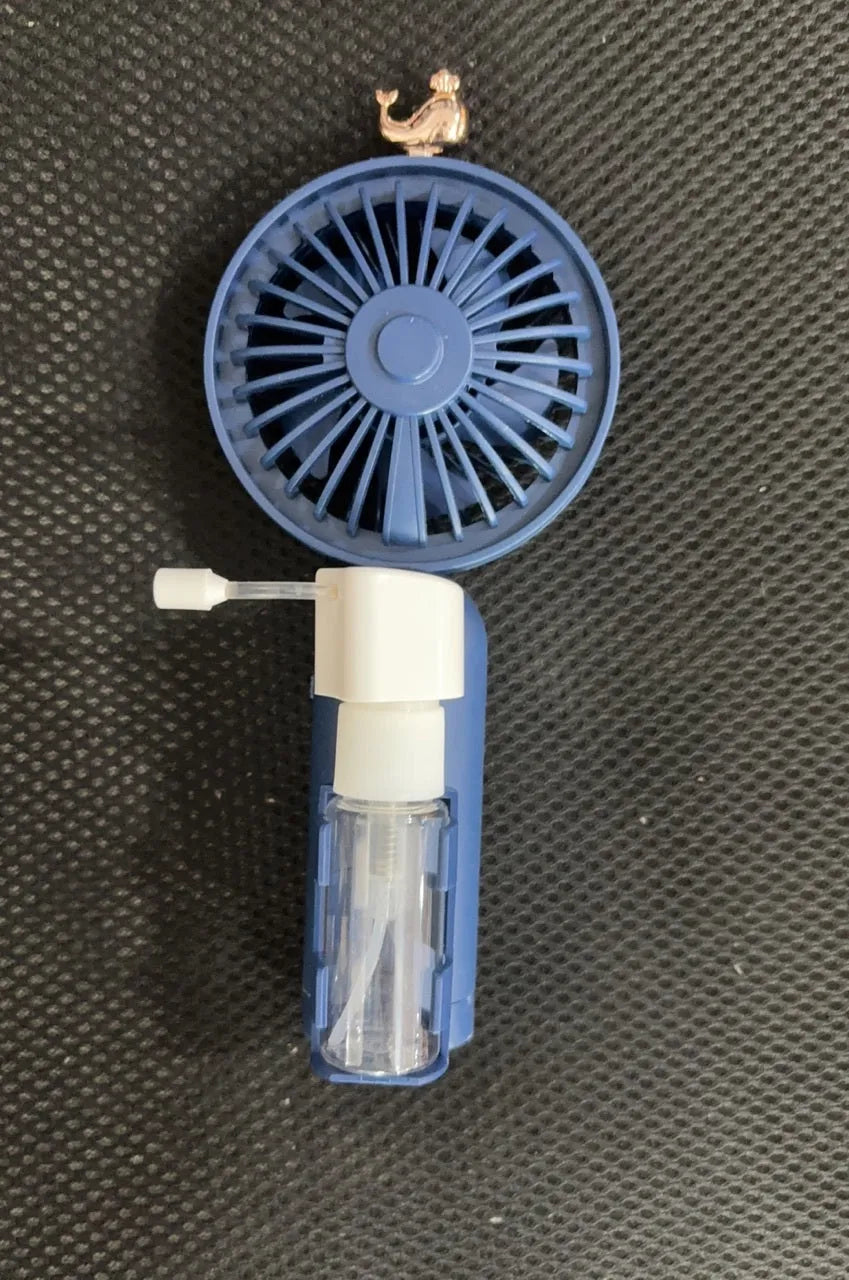 Small plastic nozzle fan in apricot colour with USB charging port