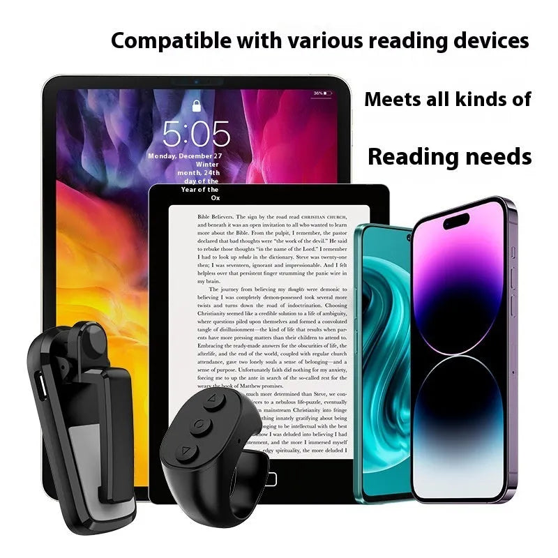 A black wireless page turner remote control and a separate clicker unit on a wooden desk.