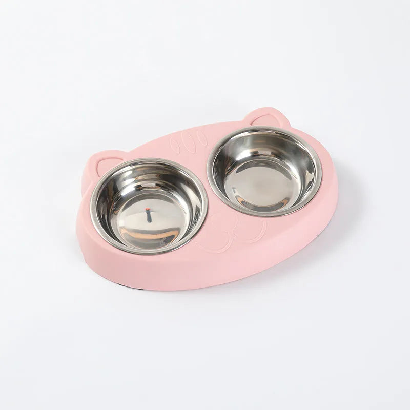 Blue plastic dual-bowl pet feeder tray for cat food and water on a white background.
