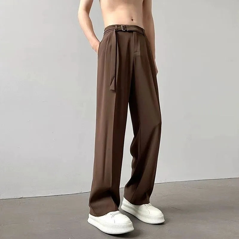 Thin straight leg black wide trousers with non-ironing finish and loose fit casual style