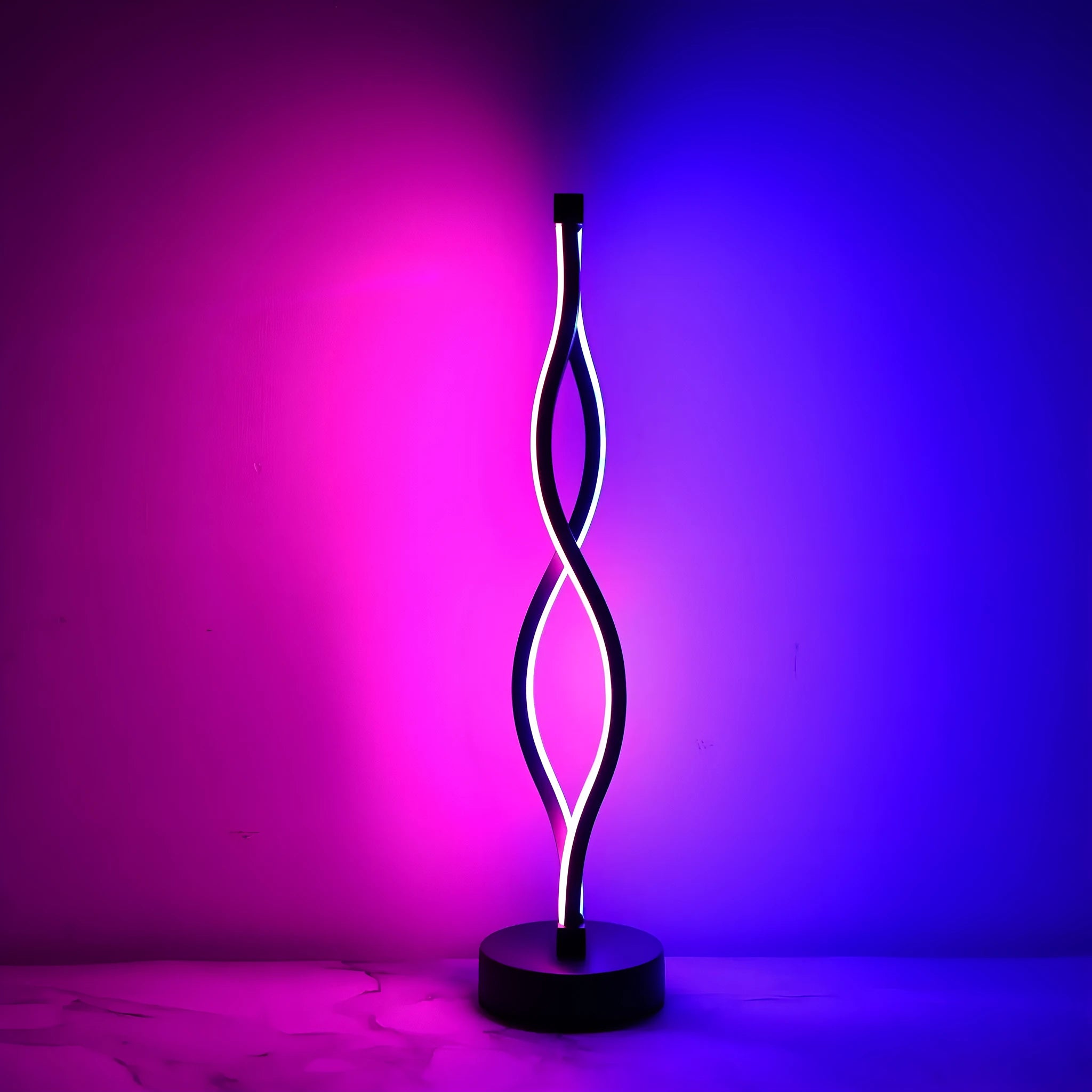 Black aluminium desk lamp with a dimming button and touch controls for blue and pink light