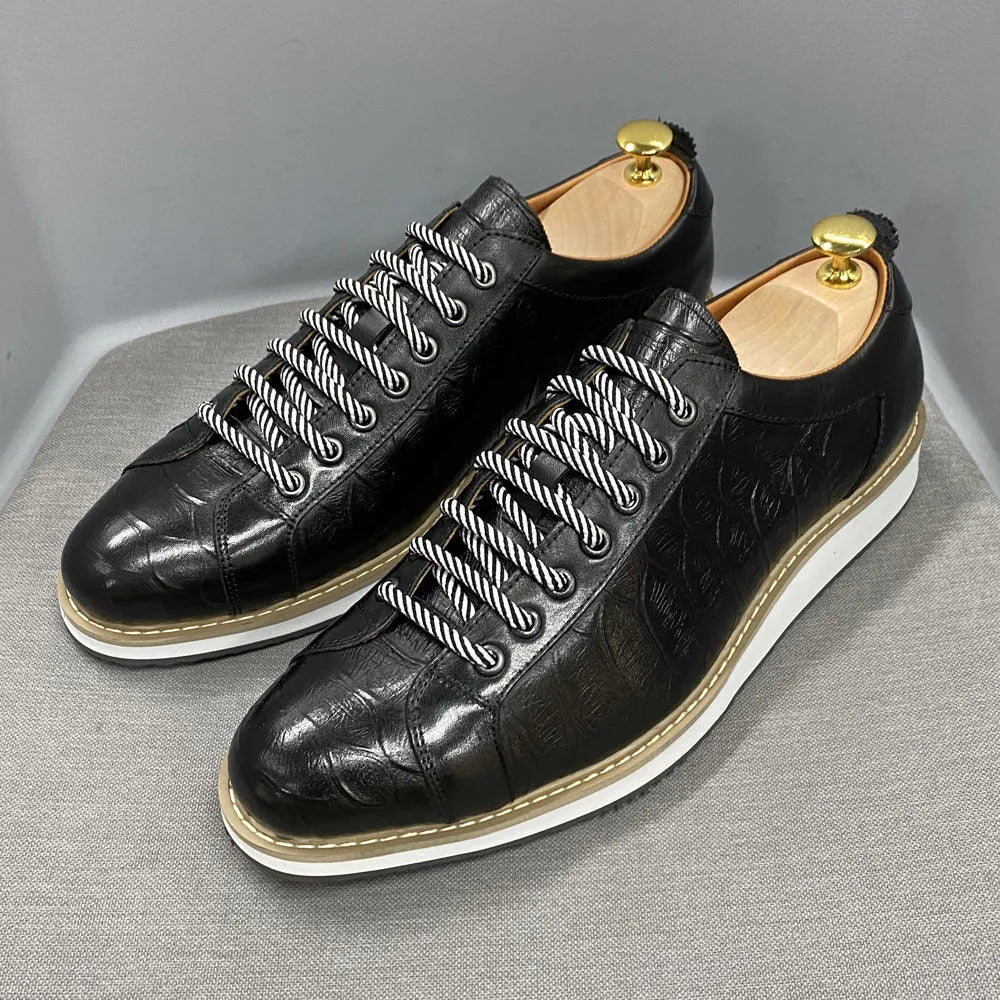 Men's fashion embossed handmade shoes in black showing front tie closure and textured upper pattern