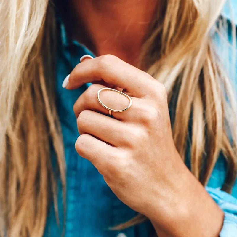 Classic minimalist copper ring with zircon inlay in rose gold colour on white background