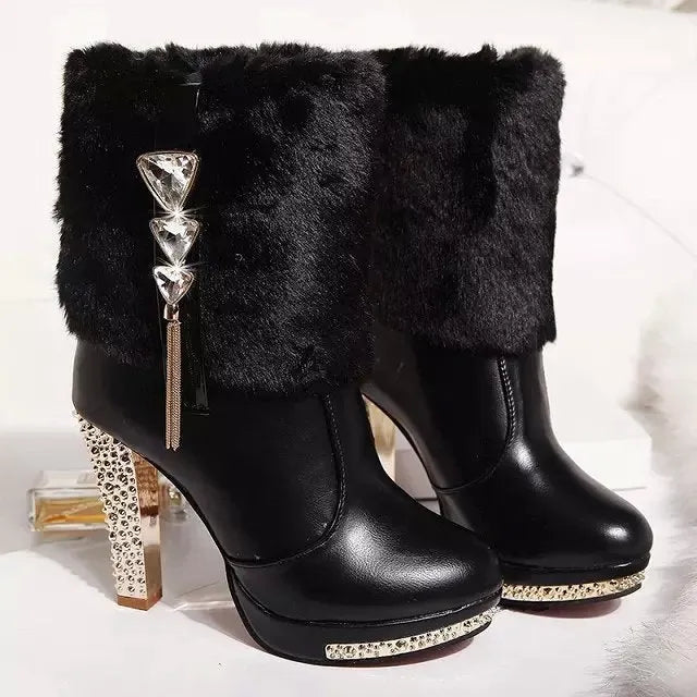 Women's black ankle boot with a high chunky heel on a white background.