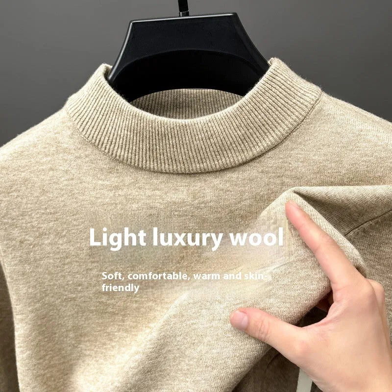 Men's solid colour fine wool half turtleneck long sleeve pullover on a hanger