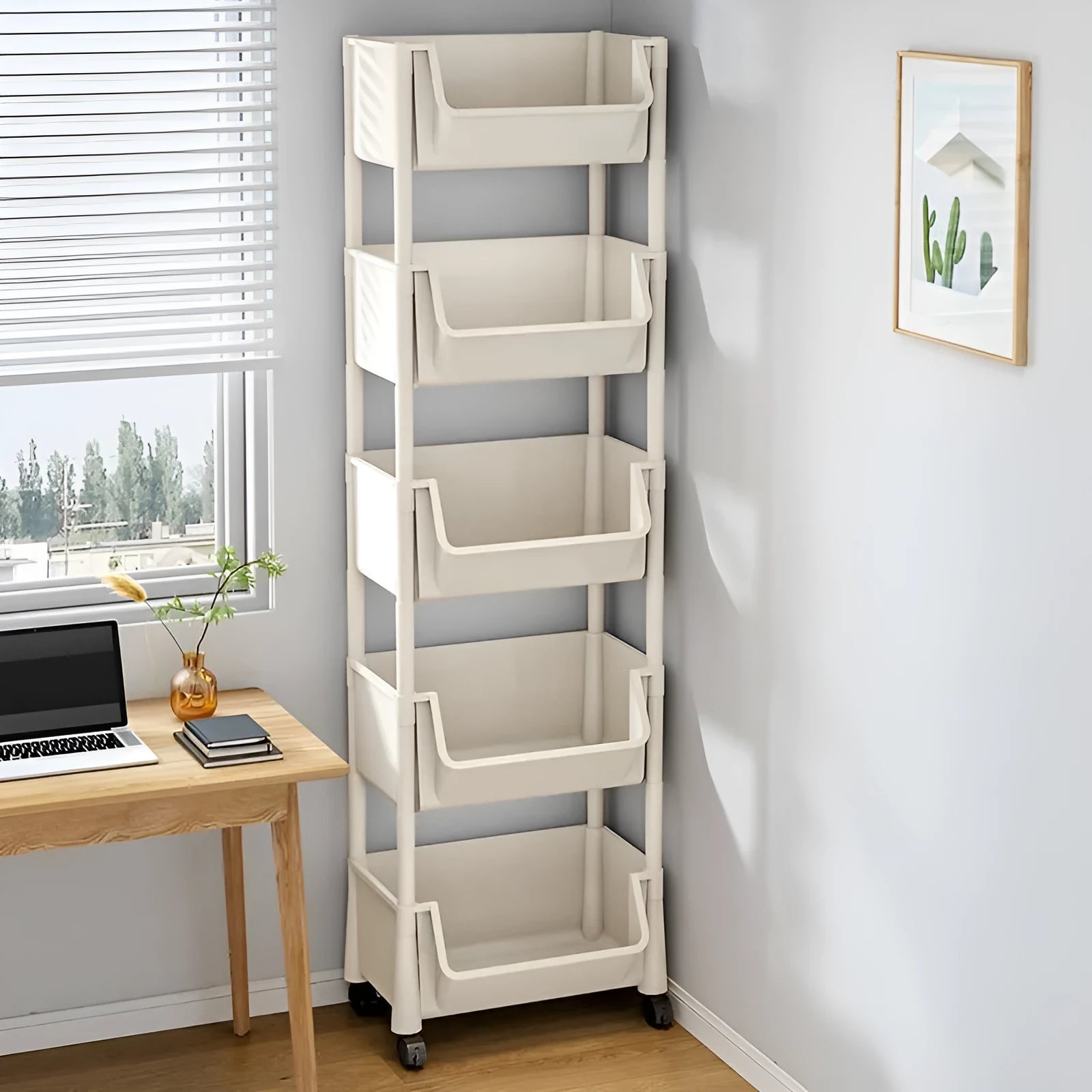 White plastic household multi-layer storage rack with wheels, rotatable, 3 layers, on a floor