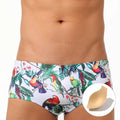 Men's navy swim trunks with white and red flower-bird print pattern, boxer briefs style