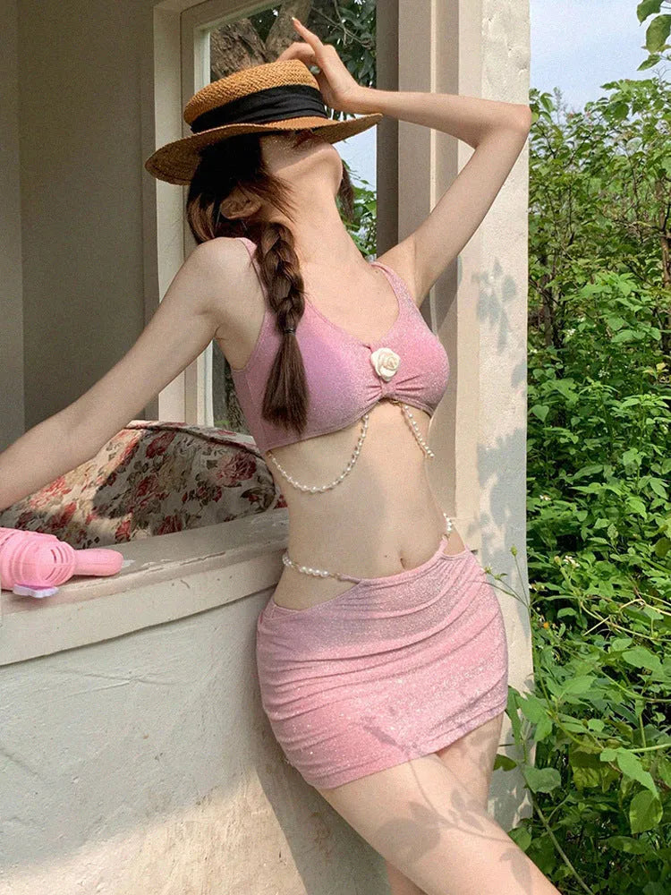 Women's three-piece bikini swimsuit set in black or pink colour with briefs style design