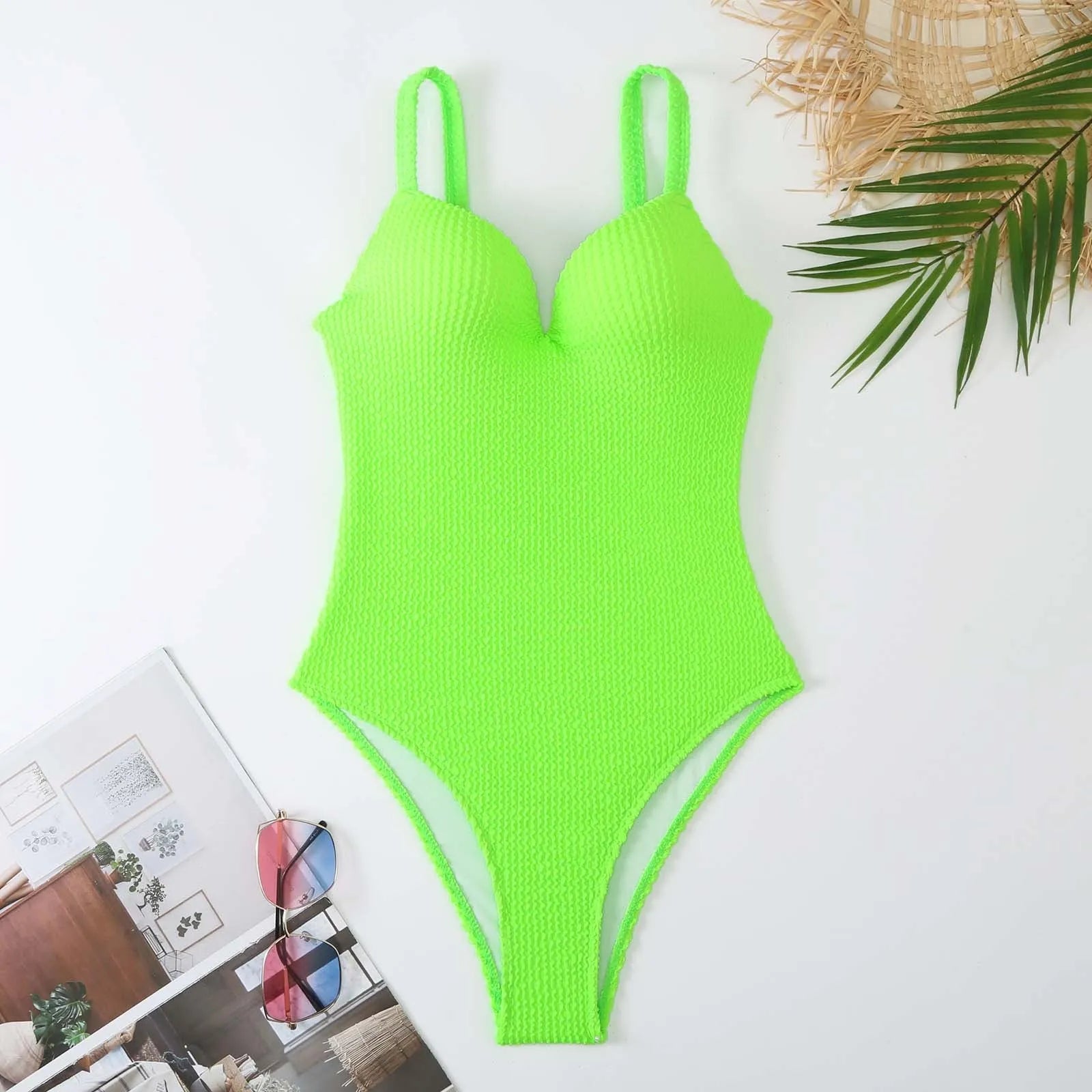 Women's sleeveless one-piece swimsuit with sunk stripe pattern in polyester fabric