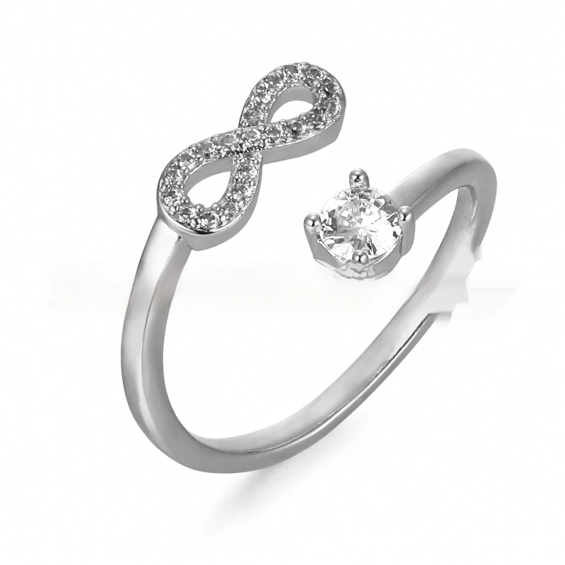 Geometric open zircon letter ring showing metal construction with inlaid gems in gold rose gold or silver finish