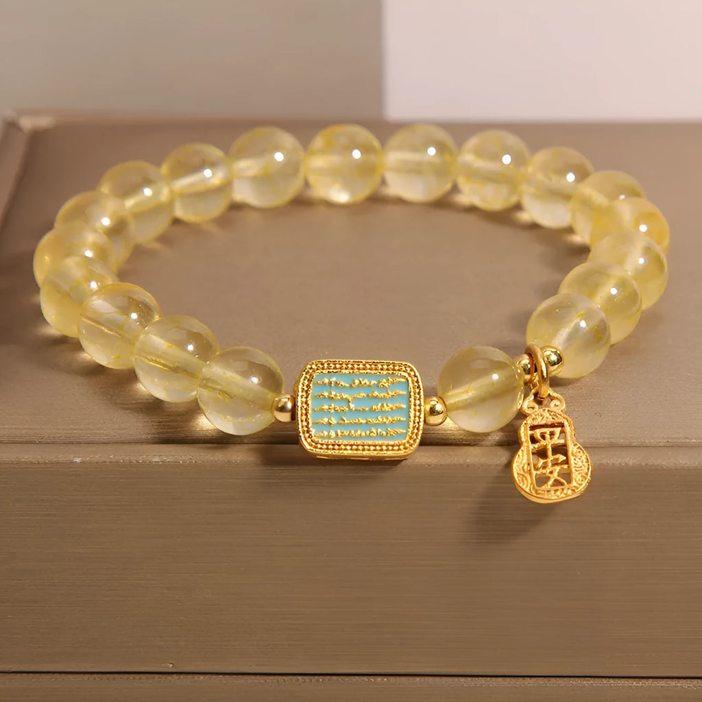 Women's natural citrine crystal bracelet with yellow colour and rhinestone detailing