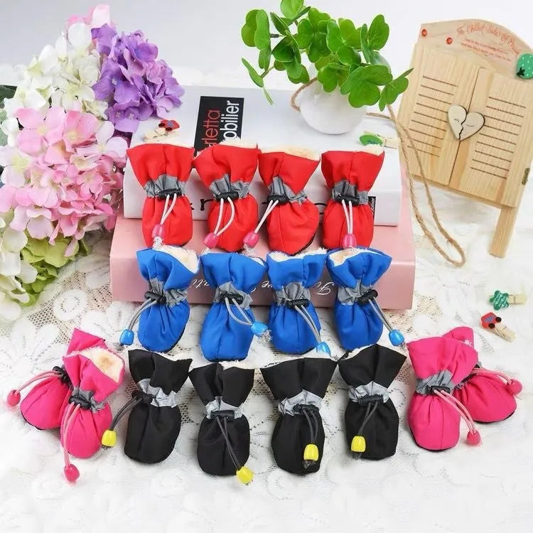 Set of four dog shoes in cloth material with soft soles, shown in multiple colour options including fleece-lined variants