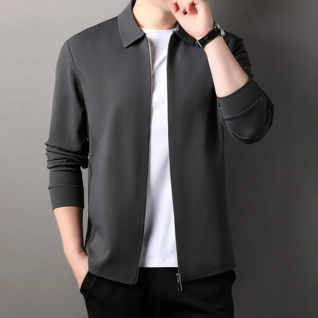 Men's casual business jacket in black, dark grey, or apricot with long sleeves and a straight hem.