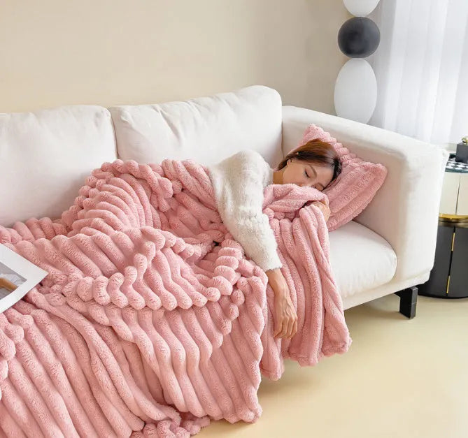 Soft Wind bubble velvet faux rabbit fur blanket in a solid colour, showing its double-sided texture.