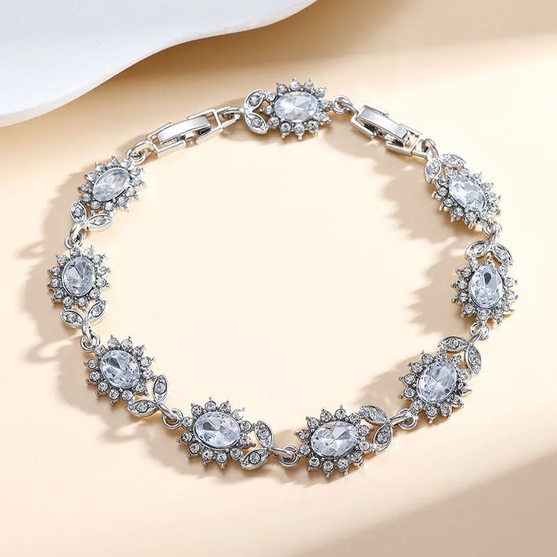 Women's zircon bracelet with electroplated finish in environmentally friendly alloy showing colour options