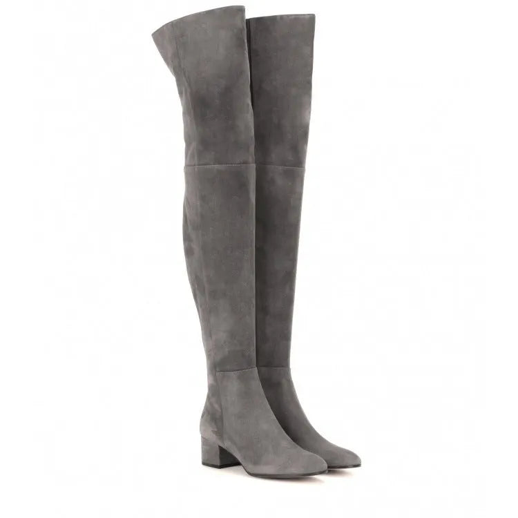 Grey suede women's flat over-the-knee boots with pointed toe and thick low heel.