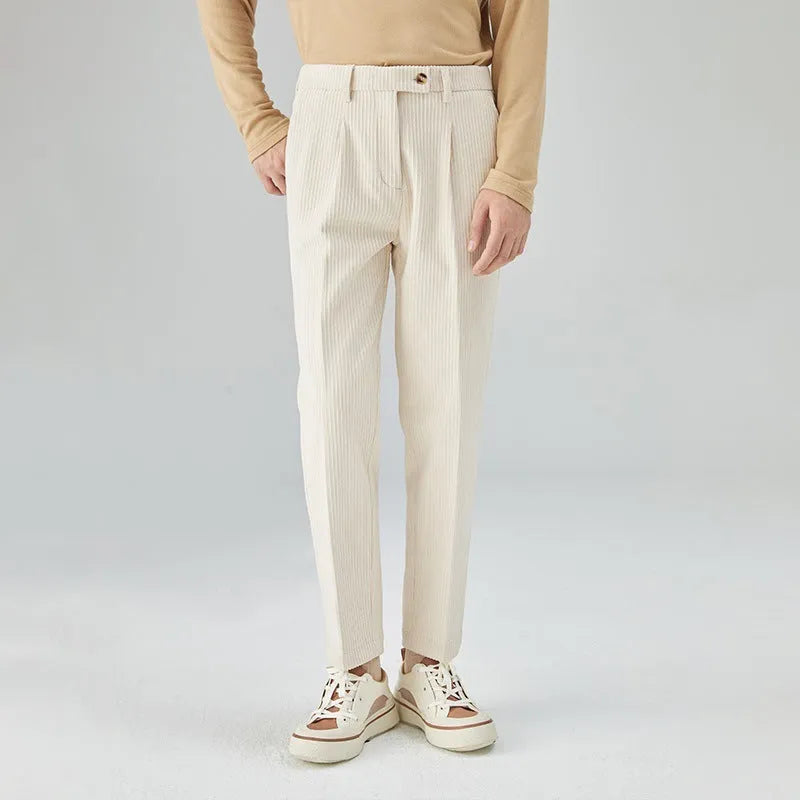 Men's straight-leg corduroy trousers in loose fit, shown in beige colour