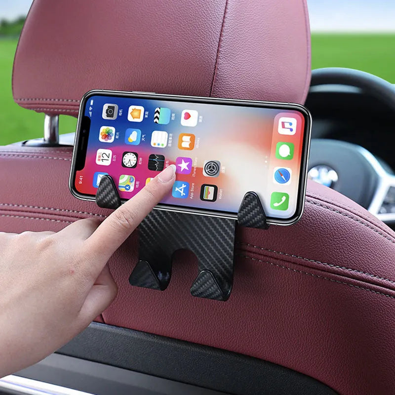 Black ABS plastic car hook with integrated mobile phone holder bracket for rear seat backs.