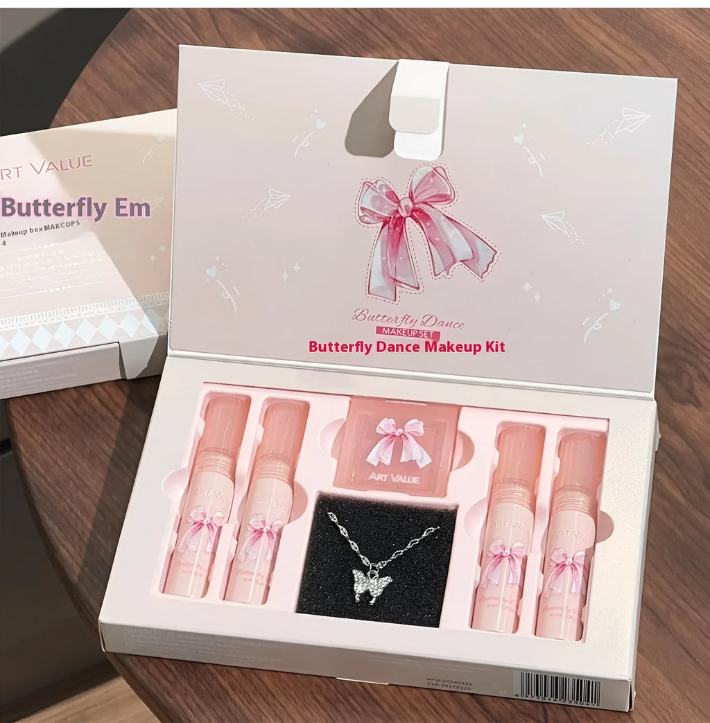 Butterfly Box makeup set showing four lip muds, powder blusher and matching necklace