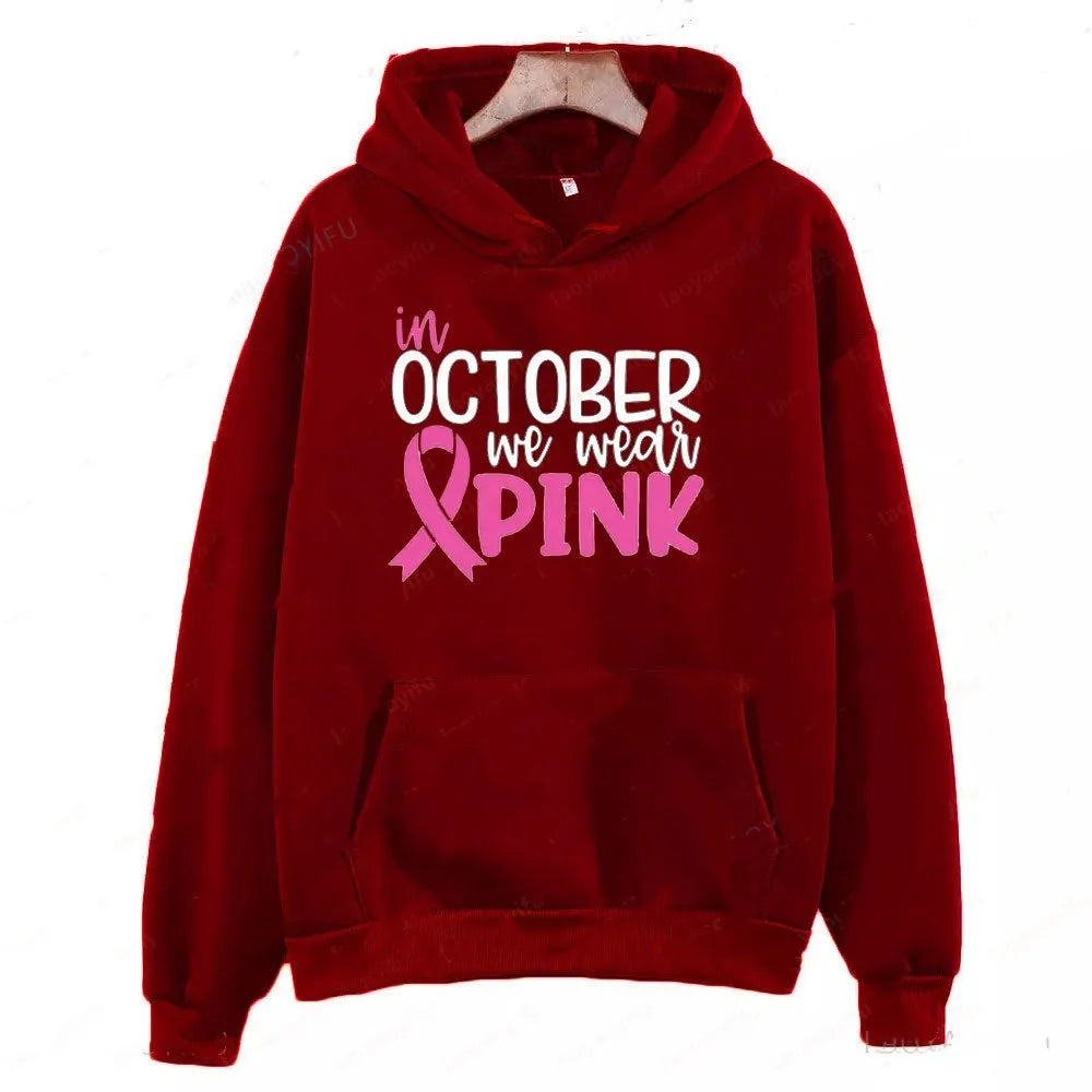 Survivor themed pullover hoodie with retro hot stamp art pattern and side seam pockets.