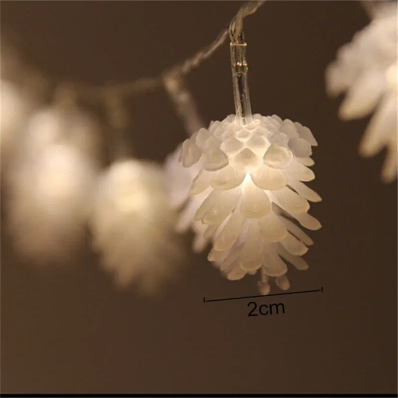 Warm white LED pine cone battery-powered string light draped decoratively