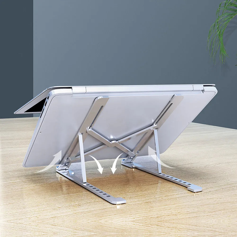 Foldable aluminum laptop stand in silver colour, shown both open in use and folded flat.
