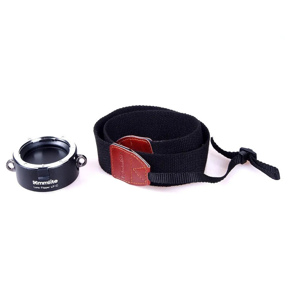 Nikon E-mount camera lens flipper with aluminium body and cotton shoulder strap