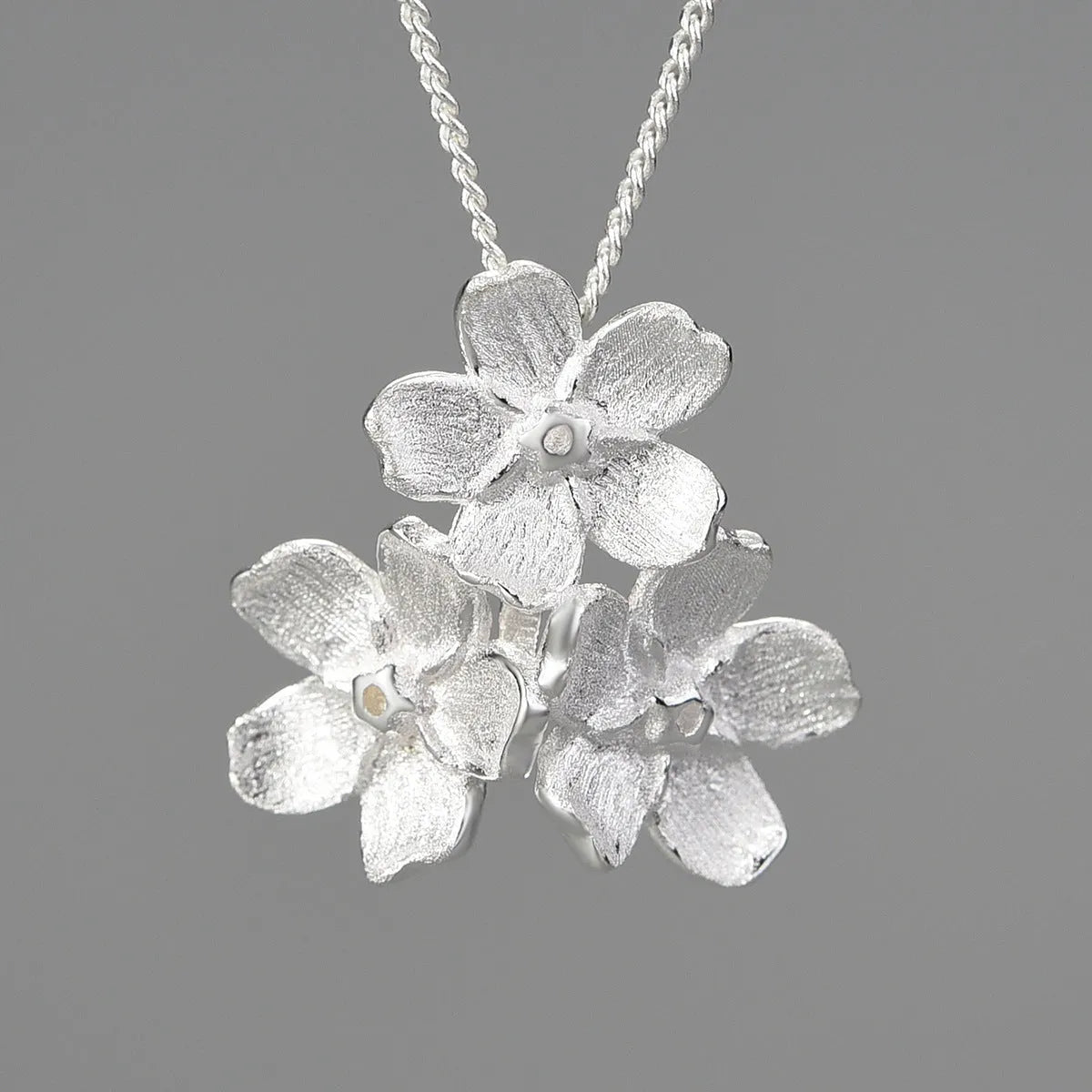 Myosotis Sylvatica sterling silver floral pendant with pastoral style design
