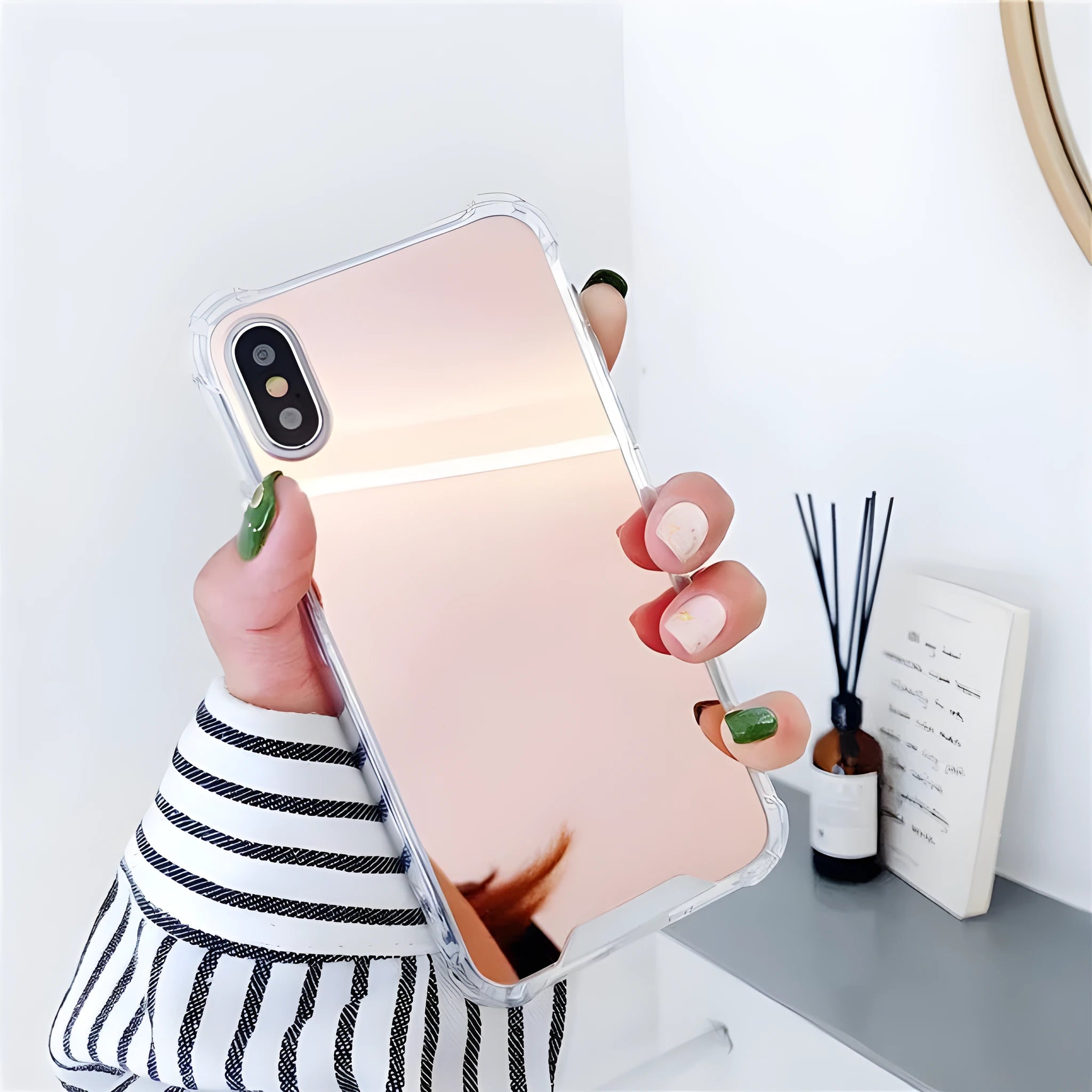 Reflective mirror phone case in soft TPU material available in multiple colours for various iPhone models showing back and side view