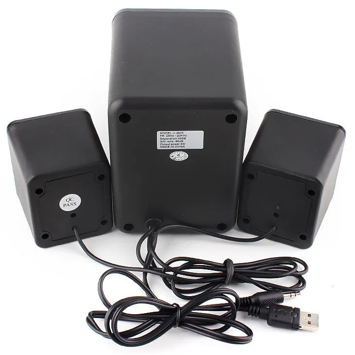 Green 2.1 USB computer speaker with colourful LED lighting on desktop