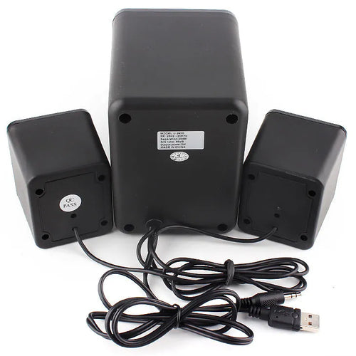 Green 2.1 USB computer speaker with colourful LED lighting on desktop
