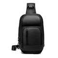 Black PVC medium shoulder bag with multiple internal compartments and adjustable strap