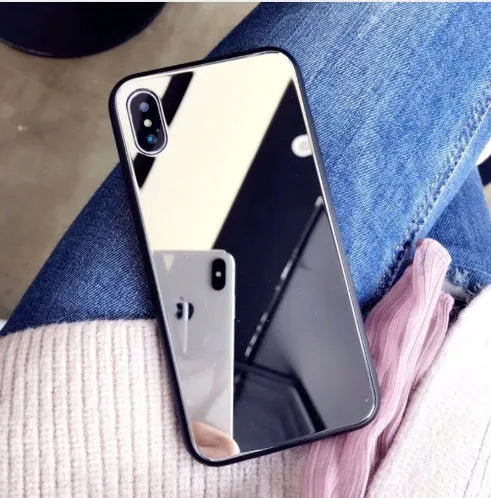 Black iPhone case with a built-in mirror on the back, compatible with iPhone X, 7, and 8 Plus models.