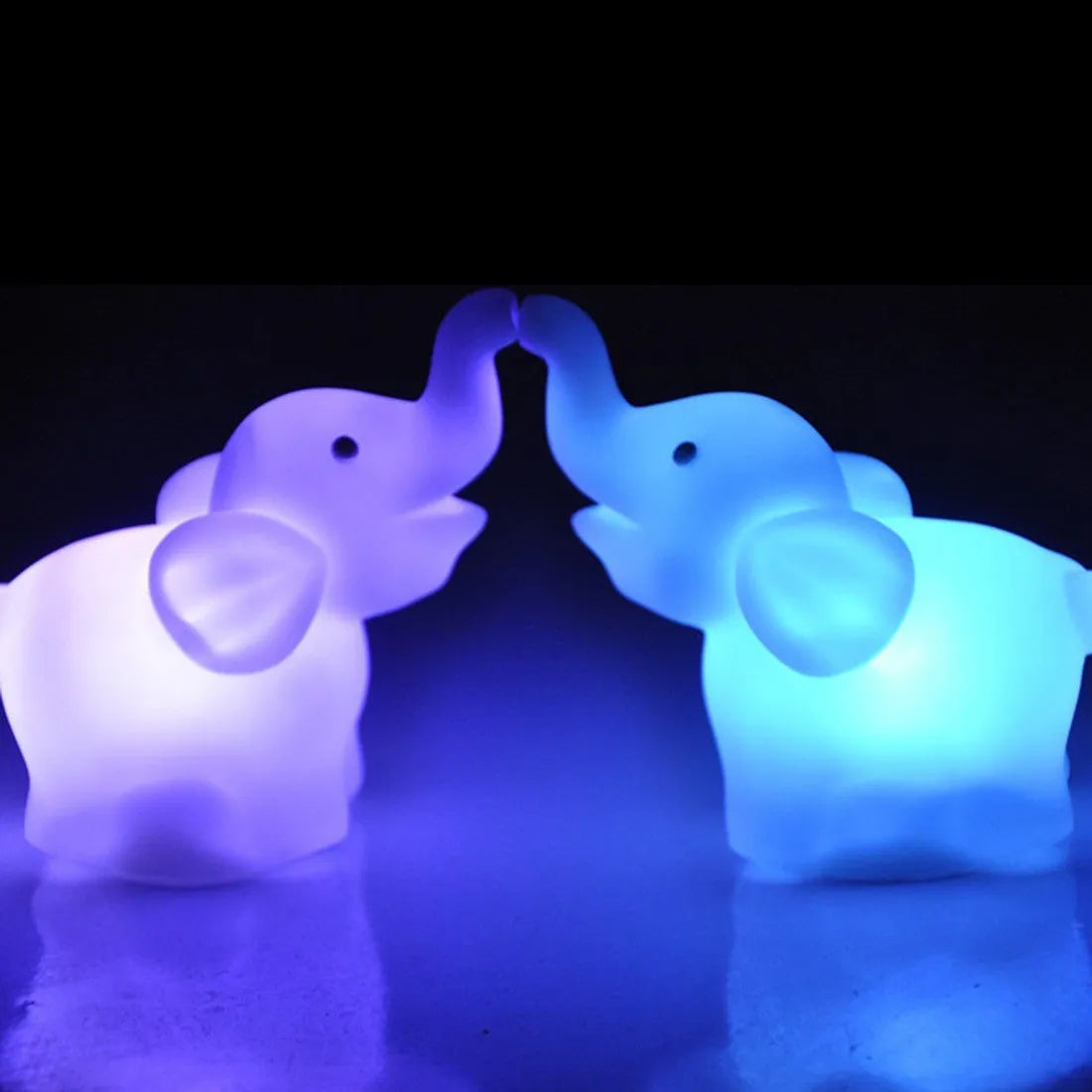 Elephant night light showing 7 colour changing modes with slow flash, vinyl body, 8x8.8x4.5cm size, battery powered