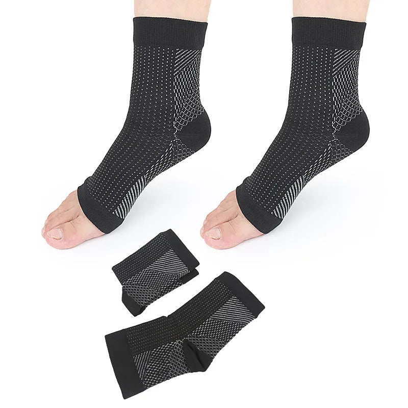 Open-toe compression foot sleeves in white and black nylon spandex with arch and ankle support for sports