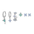 Flower shaped ear studs with blue zircon mosaic in gold and silver colour options