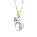 Close-up of a sterling silver cat charm clavicle chain necklace on a model.