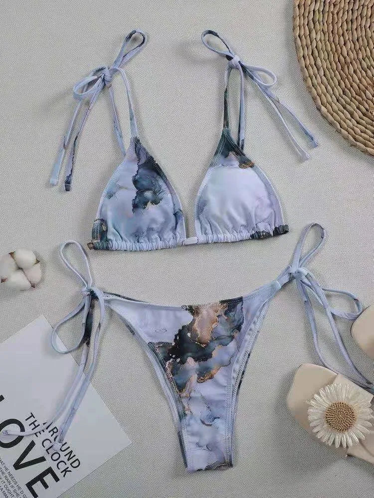 Women's high waist bikini swimsuit set with marble tie-dye print and U-neck design.