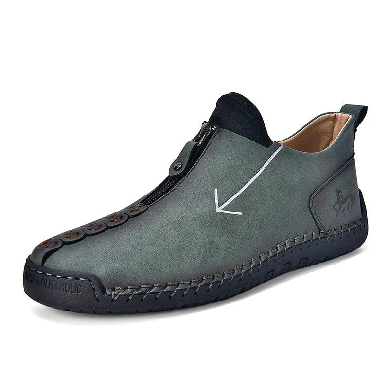 Men's brown leather martin boots with front zipper and hand-stitched detailing