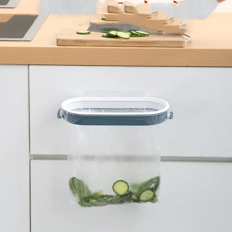 Blue plastic kitchen garbage bag storage rack mounted inside a cabinet.